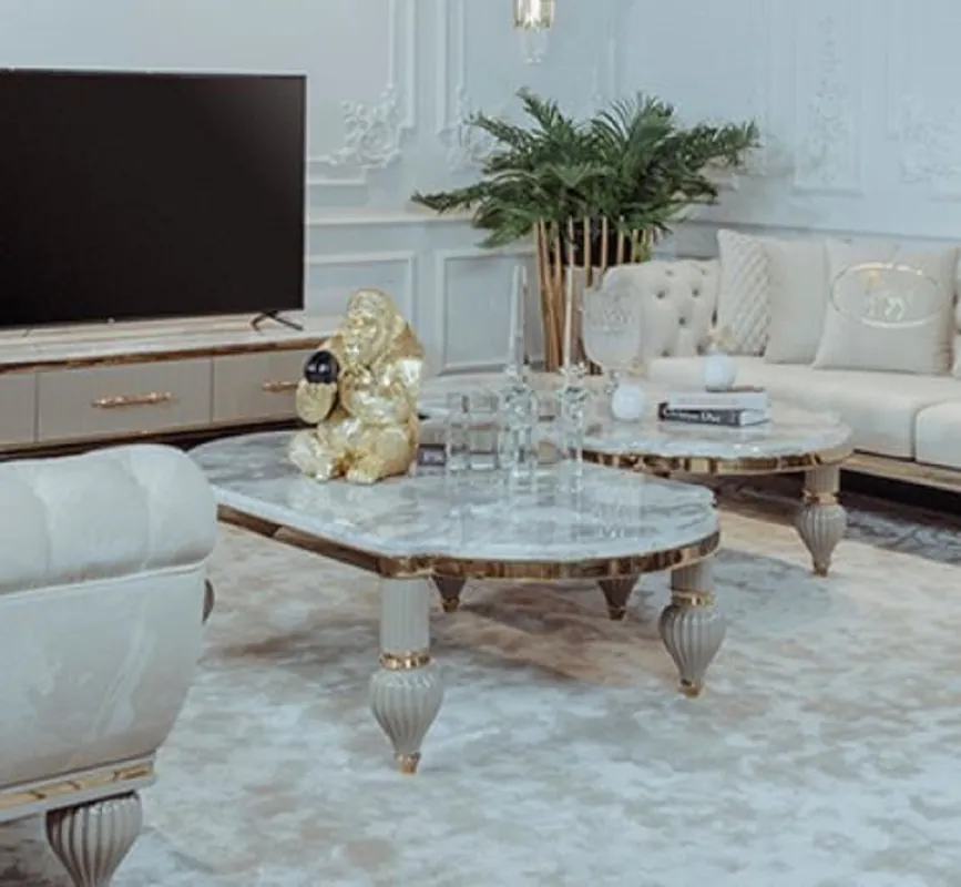 Casa Padrino Luxus Art Deco Couchtisch Grau / Weiß / Gold 160 x 87 x H. 46 cm - Prunkvoller Massivholz Wohnzimmertisch mit Kunstmarmor Tischplatte - Art Deco Wohnzimmer Möbel Preiswert