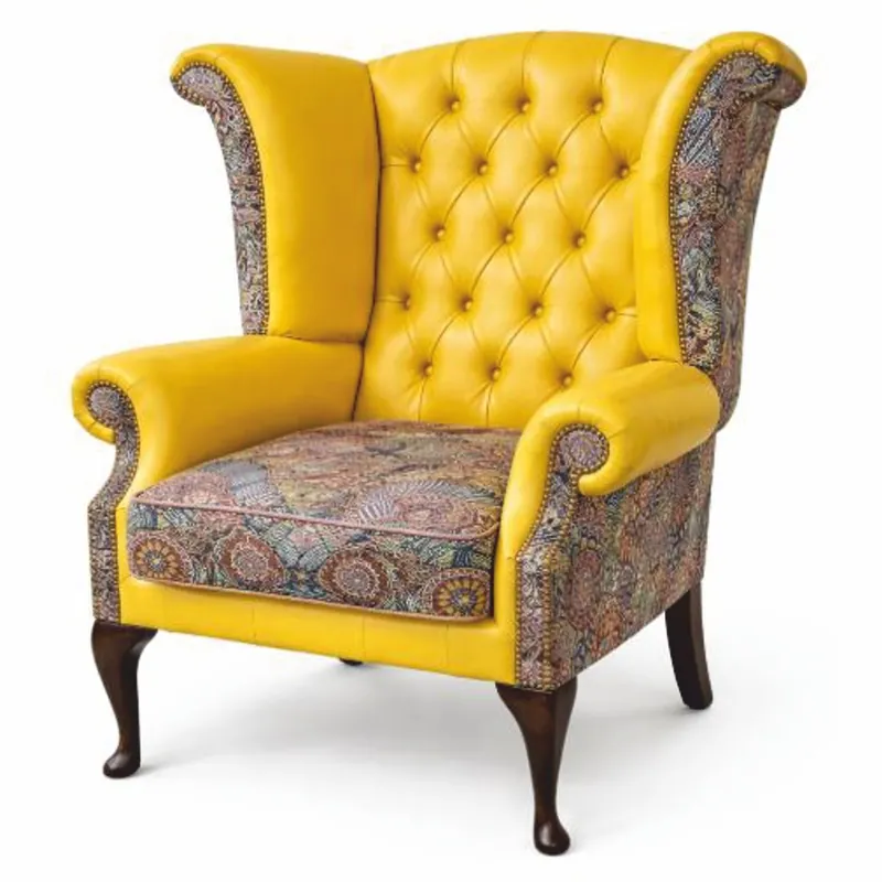 Casa Padrino sillón orejero Chesterfield de lujo amarillo / multicolor / marrón oscuro Al. 110 cm Sale
