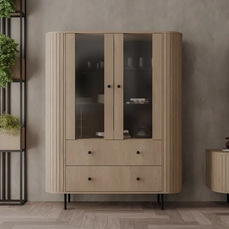 Preiswert Vitrina Ovalio 123 cm Eiche cremona Designer Vitrine für Wohnzimmer mit ovaler Form und dekorativen Fräsungen geräumige Schubladen